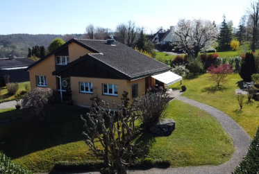 Élégante propriété d'architecte à Boncourt, vue sur les Vosges, spacieuse et prête à vivre.